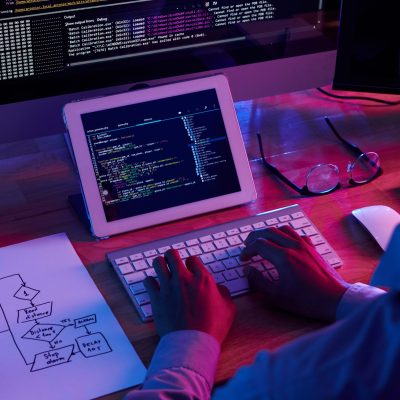 professional-programmer-working-late-dark-office-scaled